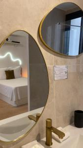 Appartements Pandora Studio Romantique, Baignoire,Clim, Wifi : photos des chambres