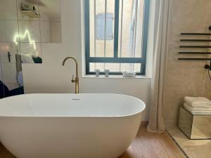 Appartements Pandora Studio Romantique, Baignoire,Clim, Wifi : photos des chambres