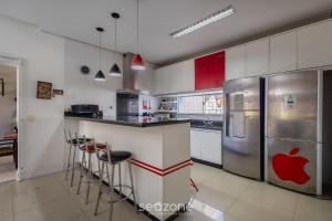 Casa 2Q c piscina e churrasqueira em Penha TZS210