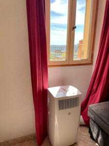 Maisons de vacances Charming little house with garden, stunning view : photos des chambres