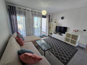 Sunny Ground floor bungalow opposite the swimming pool