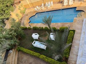 فيلا فندقيه مع حمام سباحه وحديقه 0306-888-0106