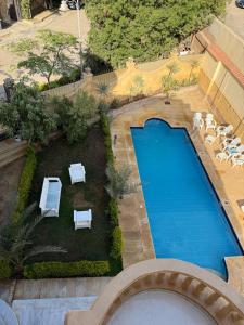 فيلا فندقيه مع حمام سباحه وحديقه 0306-888-0106