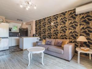 Apartment Le Soleil des Iles-3 by Interhome