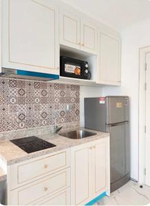 Empire Tower Luxury Suite - City View, Infinity Pool, Near Beach - Utilities included