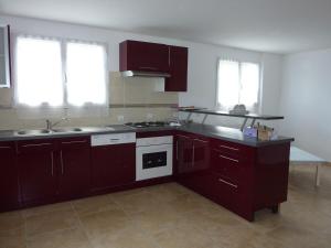 Appartement de 2 chambres en rez-de-chaussée dune maison