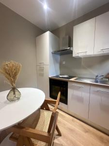 Appartements Suite by CollectionAura Centre Charleville : photos des chambres