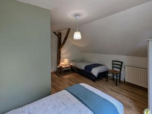 Maisons de vacances Gite spacieux au coeur des Vosges du Sud avec jardin et parking securises - FR-1-583-462 : photos des chambres