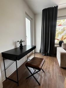 Premium Messe-Apartment No 5 - direkt gegenüber der Messe Essen mit Küche, Smart-TV, separates Schlafzimmer