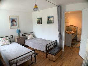Maisons de vacances 3 bed family house with garden in charming estuary village : photos des chambres