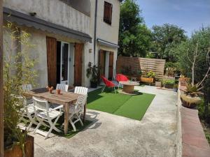 Appartements Bas de villa, terrasse au calme : photos des chambres