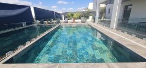 Villas villa with swimming pool : photos des chambres