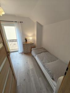 Pokoje i Domki Tomek