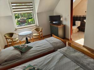 Pokoje i Domki Tomek