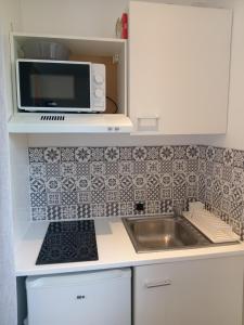Appartements Studio neuf avec jardin partage : photos des chambres