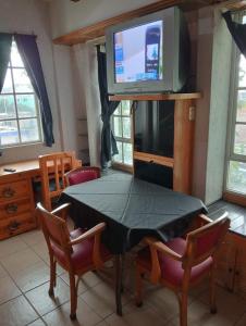 THE GREEN HOUSE BY E&M Familiar