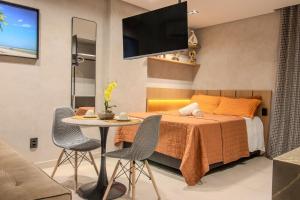 Flat a 50m da praia, com cozinha completa, estacionamento, recepção 24h, academia, lavanderia, Wi-Fi, mini mercado, Rooftop com piscina, churrasqueira e vista incrível