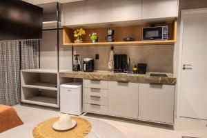 Flat a 50m da praia, com cozinha completa, estacionamento, recepção 24h, academia, lavanderia, Wi-Fi, mini mercado, Rooftop com piscina, churrasqueira e vista incrível