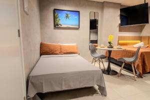 Flat a 50m da praia, com cozinha completa, estacionamento, recepção 24h, academia, lavanderia, Wi-Fi, mini mercado, Rooftop com piscina, churrasqueira e vista incrível
