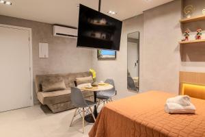 Flat a 50m da praia, com cozinha completa, estacionamento, recepção 24h, academia, lavanderia, Wi-Fi, mini mercado, Rooftop com piscina, churrasqueira e vista incrível