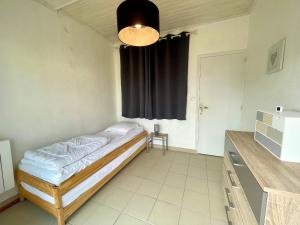 Maisons de vacances **Maison 3 pieces avec jardin a 350m du bord de mer - Wifi, terrasse, parking** - FR-1-231-220 : photos des chambres