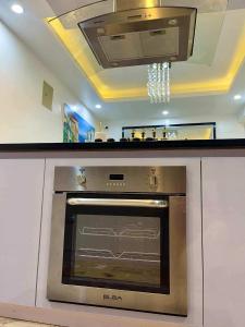 Cai Residence - Stylish 2BR Staycation near EK & Tagaytay Gateway