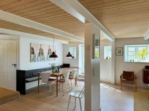 Historic Thatched House From 1750 In Husby