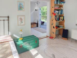 Cottage In Woodland Garden In Natural Harmony