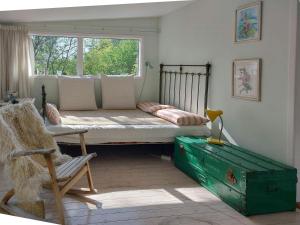 Cottage In Woodland Garden In Natural Harmony
