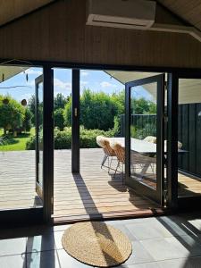 House In Nature By The Water At Langø