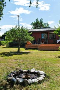 The Red Summer House With The Lush Garden At Asnæs