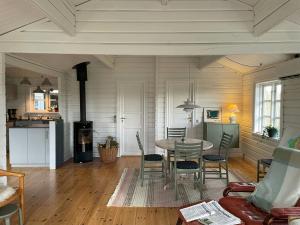 Bright House In Dune Row Near The North Sea