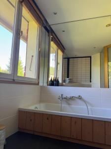 Appartements appartement 103m2 pres de Megeve, face a telecabine la Princesse,2 chambres , garage, local a ski : photos des chambres