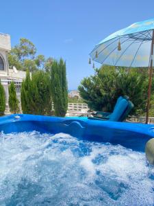 Villa by the sea with jacuzzi, garden & park view