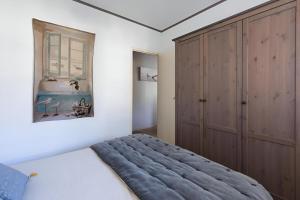 Maisons de vacances Maison familiale avec piscine au Cap Ferret Gite chaleureux 5 chambres ideal pour familles avec enfants Proche plages pistes cyclables et foret Calme confort et nature pour des vacances inoubliables proche Arcachon : photos des chambres