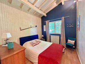 Maisons de vacances Maison familiale avec piscine au Cap Ferret Gite chaleureux 5 chambres ideal pour familles avec enfants Proche plages pistes cyclables et foret Calme confort et nature pour des vacances inoubliables proche Arcachon : photos des chambres