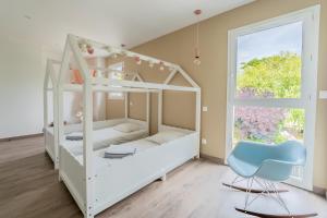 Villas Villa climatisee avec piscine et stationnements : photos des chambres
