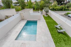 Villas Villa climatisee avec piscine et stationnements : photos des chambres