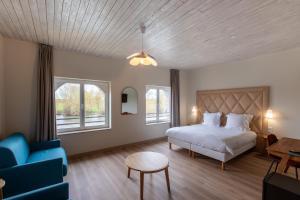 Hotels Domaine de la Courbe Hotel & Spa : photos des chambres
