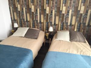 Appartements La legende Roc-h ar conq - Centre-ville Brignogan-Plages , 300 m des plages : photos des chambres