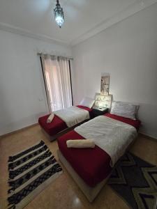 Bel appartement RDJ face piscine résidence haut standing