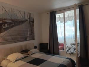 Appartements Cosy au bassin : photos des chambres