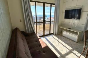 Apartamento com vista mar sobre a avenida