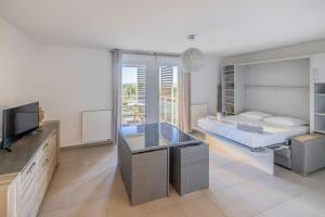 appartement 1ère ligne avec parking et terrasse vue mer