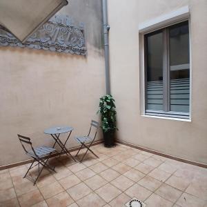 Appartements large studio near train station, very central : photos des chambres