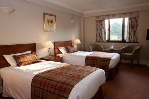 Twin Room room in Stirrups Hotel