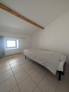 Maisons de vacances Evasion vigneronne, jolie maison de village en pierre : photos des chambres