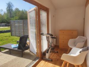 Chalets chalet de Campagne avec option SPA - petit dej : photos des chambres