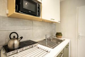 Appartements les Jardiniers : photos des chambres
