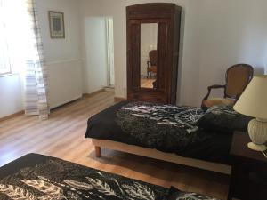 Maisons de vacances Logement Chateau de Villeneuve : photos des chambres